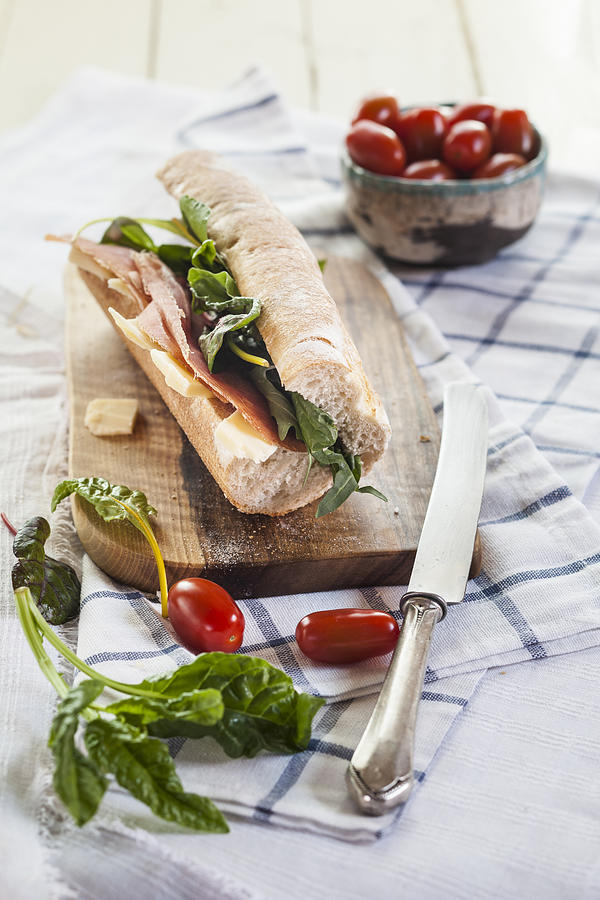French bread with Jamon serrano, cheese, tomatoes and lettuce #2 Photograph by Westend61