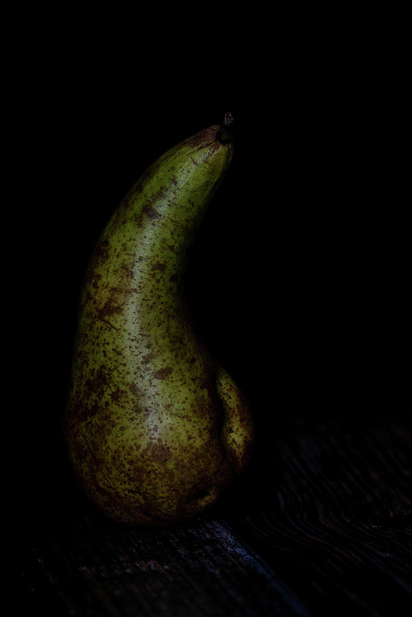 Fresh And Healthy Pear Fruit On A Black Background Photograph