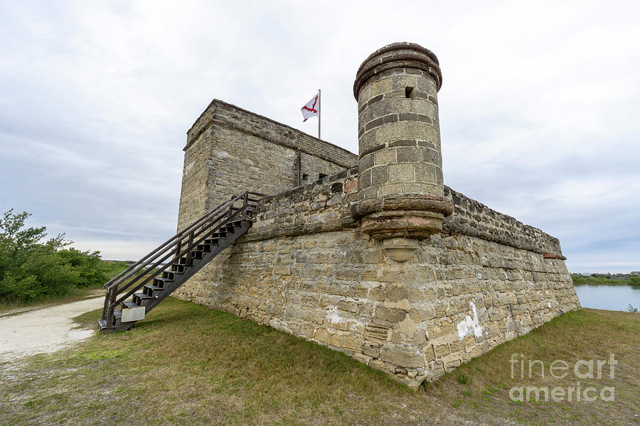 Garita, or sentry box, and Spanish flag at Fort Matanzas Nationa #2 Photograph by William Kuta