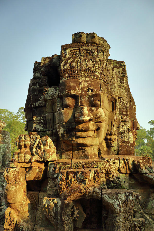 Giant stone faces at Bayon Temple in Cambodia #2 Photograph by Mikhail Kokhanchikov