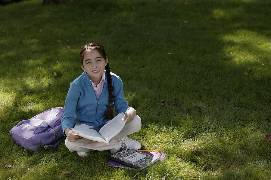 Girl studying outdoor #2 Photograph by Comstock Images
