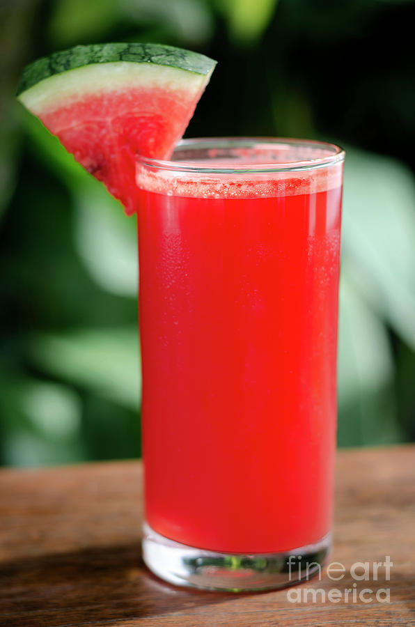 Glass Of Fresh Organic Watermelon Juice On Table Outdoors #2 Photograph by JM Travel Photography