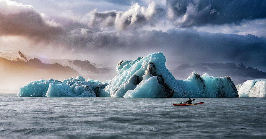 Iceberg Sunset with Kayak Photograph by Dee Potter