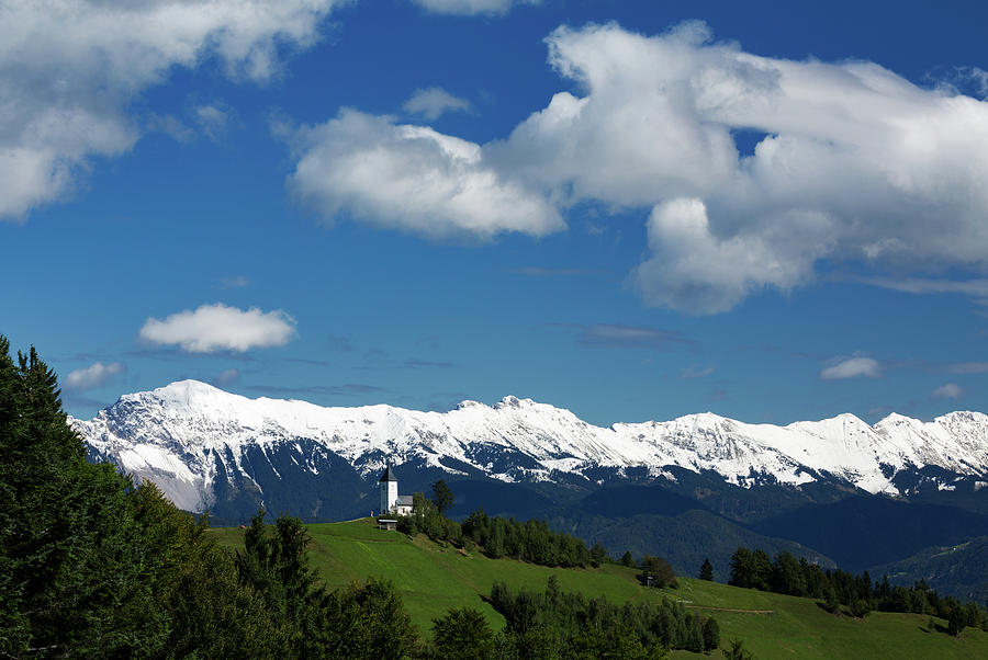 Jamnik church with Karavanke Alps backdrop #2 Photograph by Ian Middleton