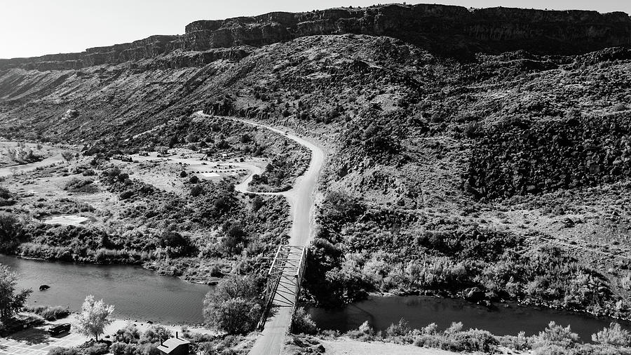 Low road to Taos New Mexico with bridge in black and white #2 Photograph by Eldon McGraw