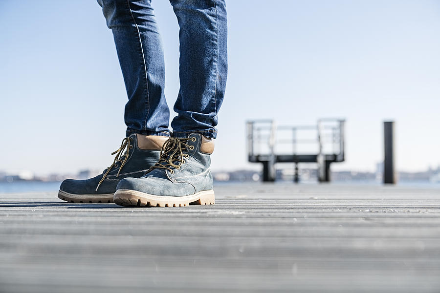 Low section of man standing on pier on sunny day in Germany. #2 Photograph by Tina Terras & Michael Walter