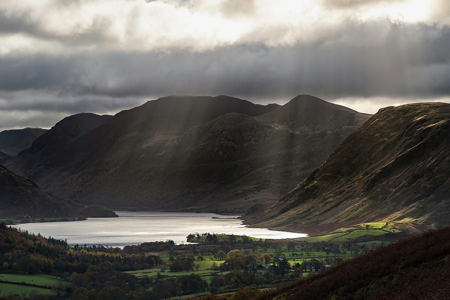 Fall Photograph - Majestic sun beams light up Crummock Water in epic Autumn Fall l #2 by Matthew Gibson