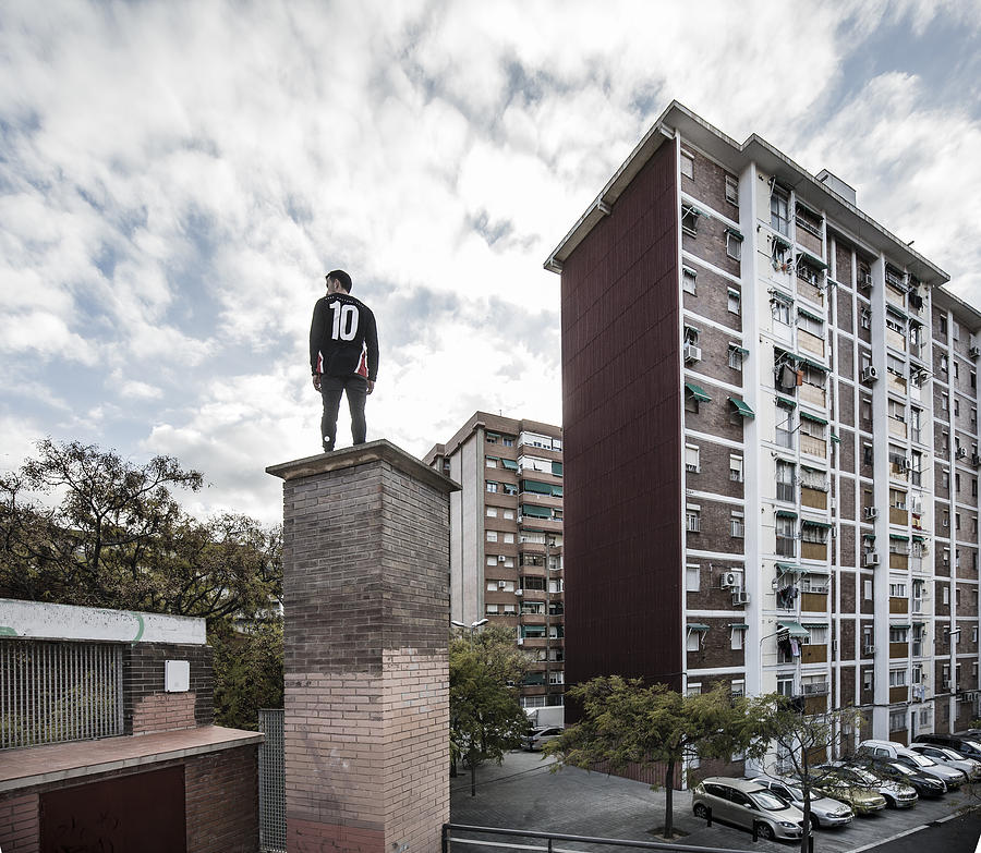Man practicing parkour in city suburbia #2 Photograph by Aluxum