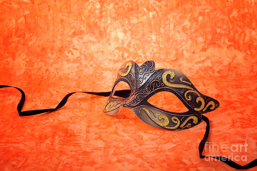 Mardi Gras mask on orange background.  #2 Photograph by Milleflore Images