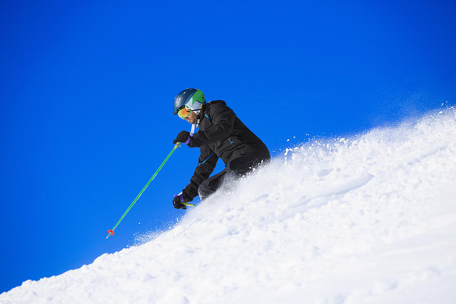 Mature men off piste skiing  powder snow  sunny ski resorts #2 Photograph by Ultramarinfoto