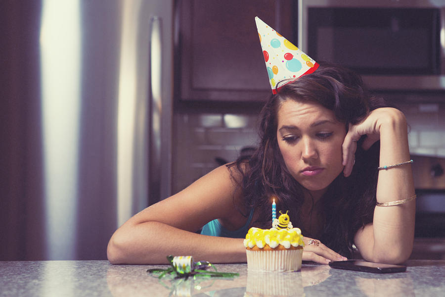 Melancholy woman at home celebrating her birthday all alone #2 Photograph by Inhauscreative