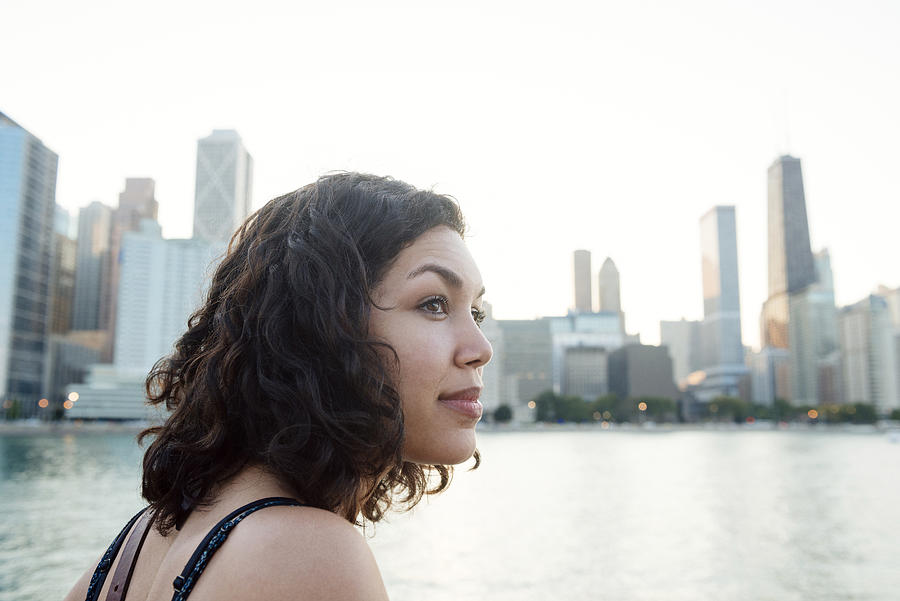 Millennial Hispanic Woman by Chicago Skyline in Contemplation #2 Photograph by Boogich