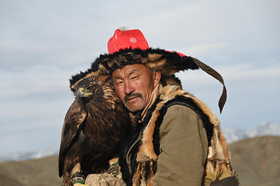 Mongolian Eagle hunters Photograph by Andrew Chittock - Fine Art America