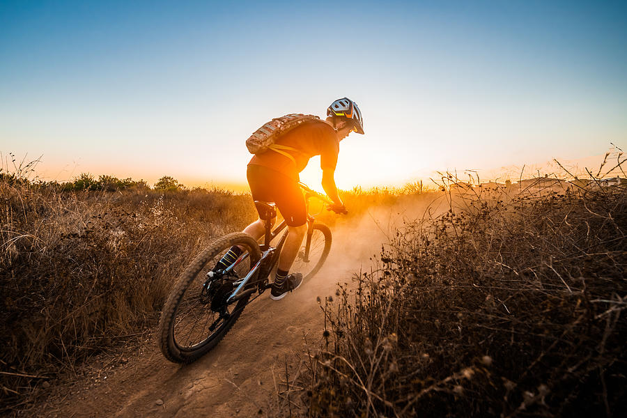 Mountian Biker Riding Into The Sunset #2 Photograph by MichaelSvoboda