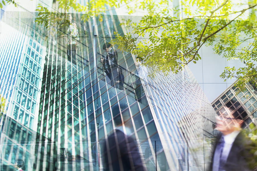 Multi layered, walking businessmen with cityscape #2 Photograph by Hiroshi Watanabe