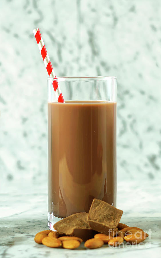 Nutritious vanilla, chocolate and cinnamon almond milk in glasse #2 Photograph by Milleflore Images