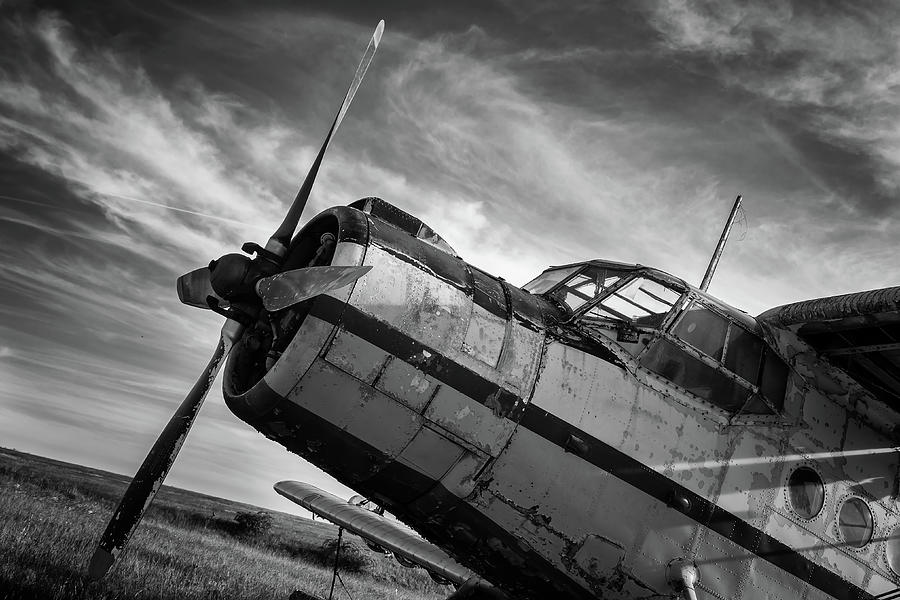 Old Airplane On Field In Black And White Photograph
