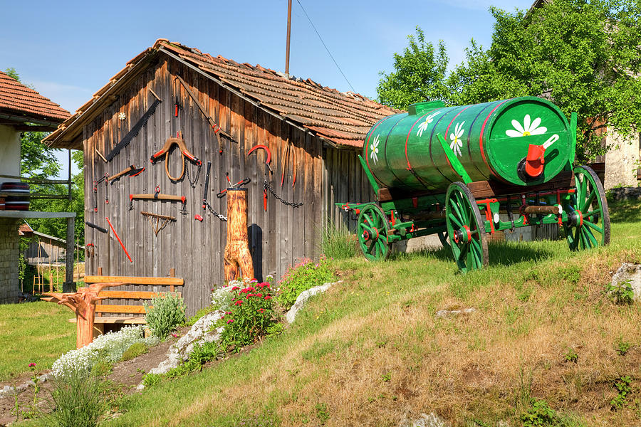 Old farm machinery in Nova Vas, Slovenia #2 Photograph by Ian Middleton