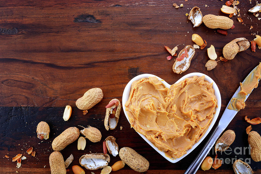 Bowl Photograph - Peanut Butter in Heart Dish #2 by Milleflore Images
