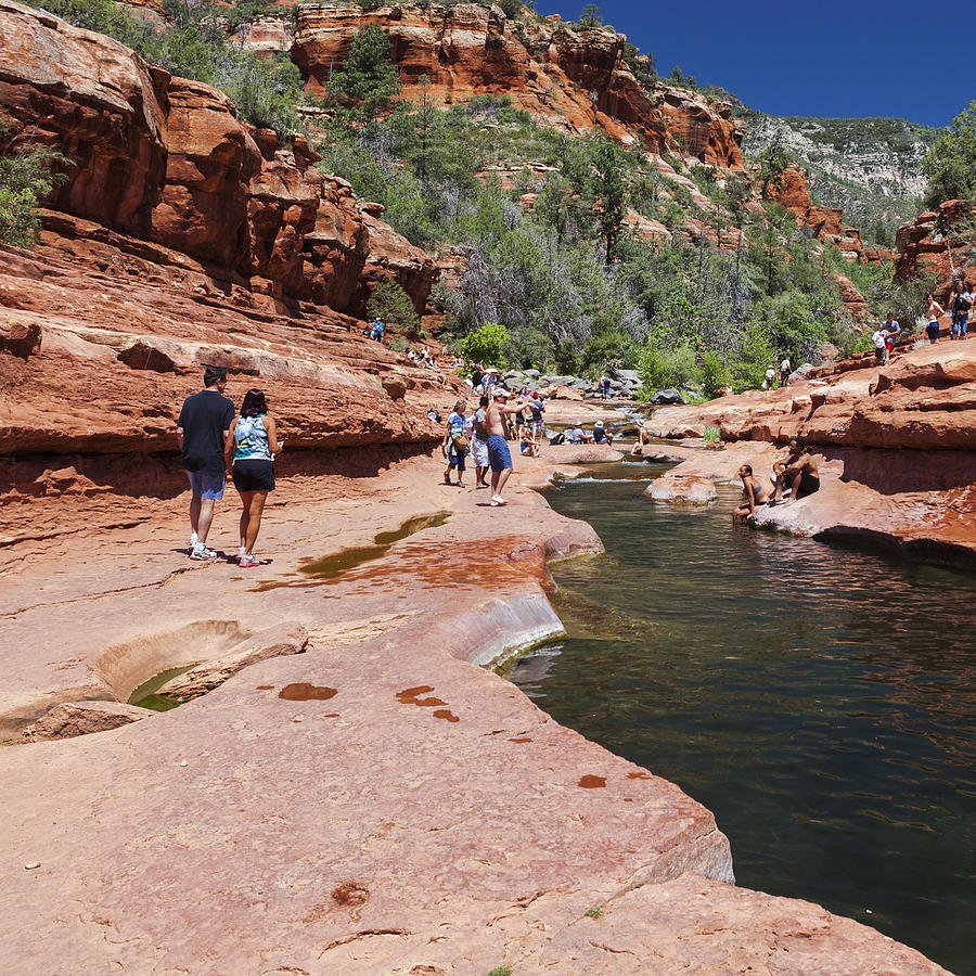 People at Oak Creek Cascades at Slide Rock State Park in Arizona, United States #2 Photograph by Powerofforever