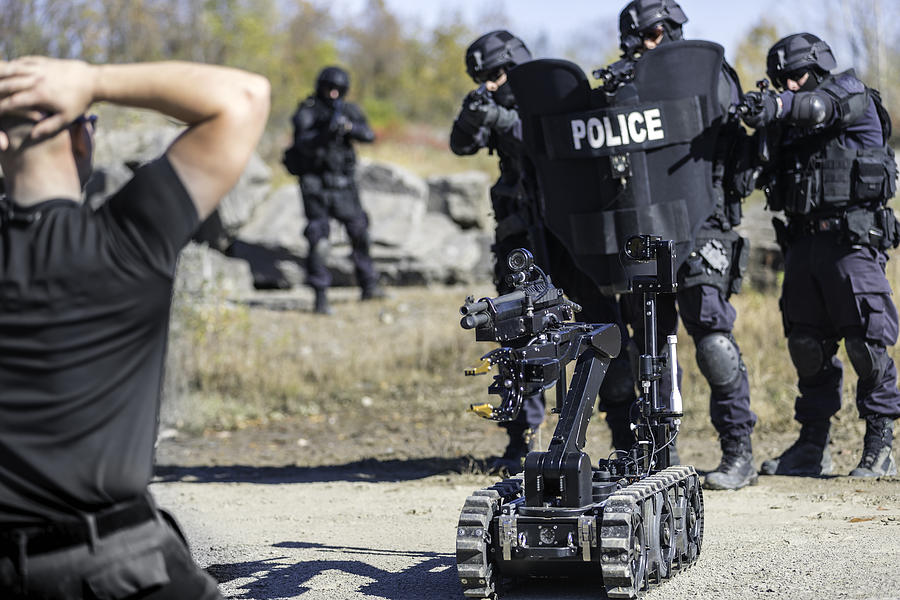 Police Swat Team Officers Using a Mechanical Robot Unit #2 Photograph by Onfokus