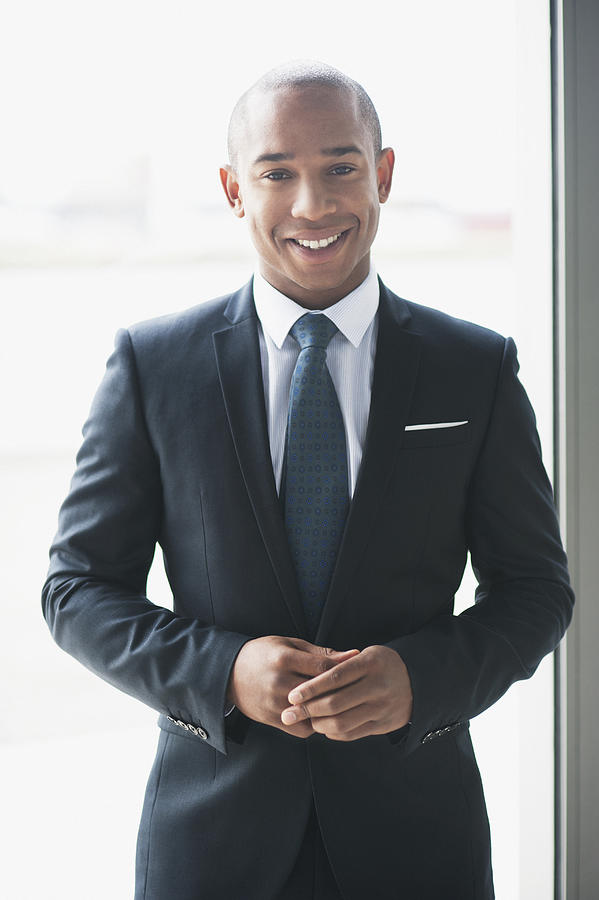 Portrait of businessman, smiling #2 Photograph by David Lees