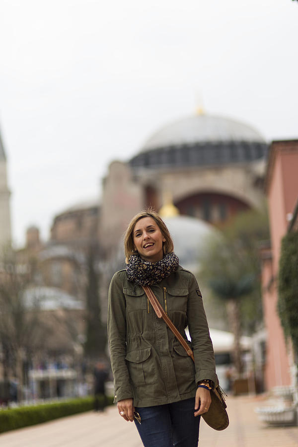 Pretty traveller woman - Hagia Sophia Museum in the background #2 Photograph by Ruzgar344