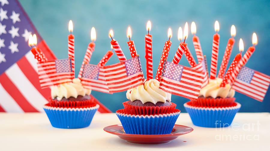 Red white and blue theme cupcakes with USA flags #2 Photograph by Milleflore Images