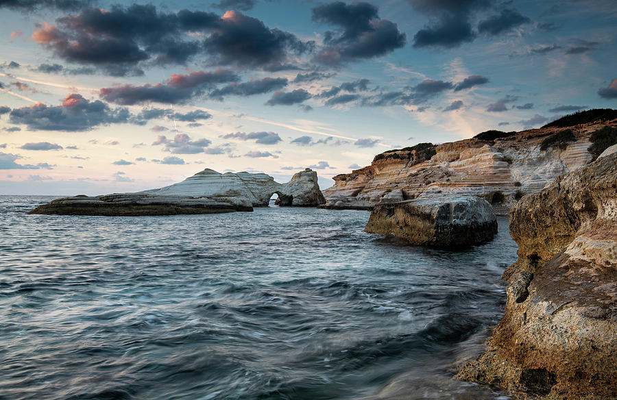 Rocky seashore seascape with dramatic and amazing sunset. Photograph by Michalakis Ppalis