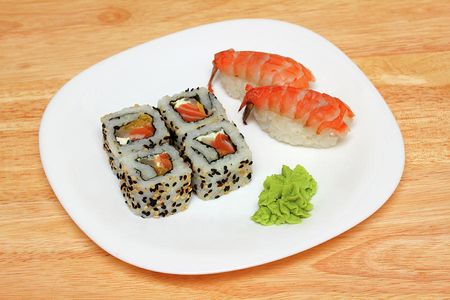 Rolls And Sushi On Plate #2 Photograph by Mikhail Kokhanchikov