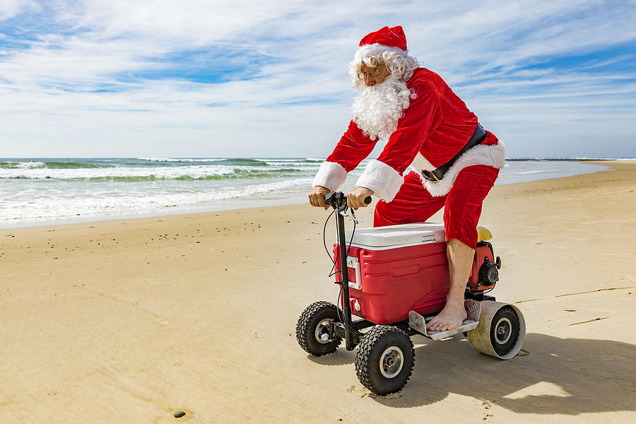 Santa Claus Riding a Motorised Esky Cooler on the Beach #2 Photograph by Davidf
