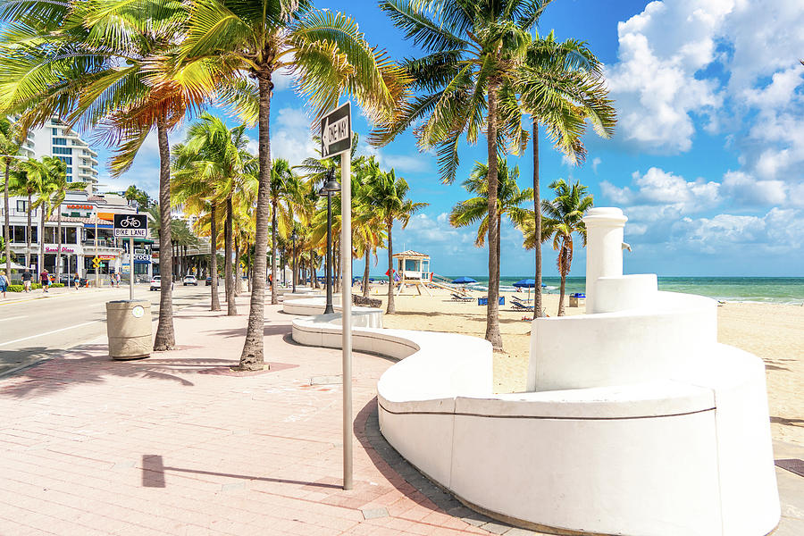 Seafront beach promenade with palm trees on a sunny day in Fort Lauderdale Photograph by Maria Kray