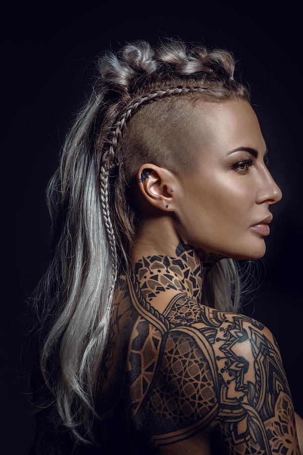 Side portrait of a tattooed viking blonde female and her unique hairstyle #2 Photograph by Lorado
