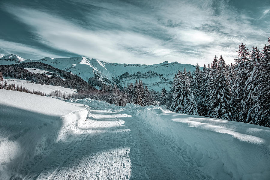 Snowy road in the French Alps Photograph by Benoit Bruchez