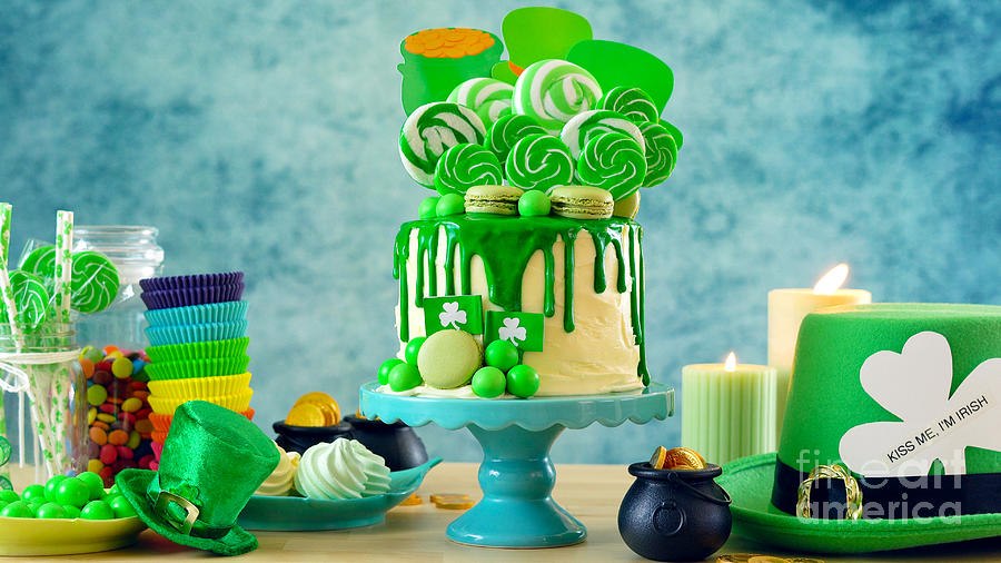 St Patricks Day candyland drip cake and party table. #2 Photograph by Milleflore Images