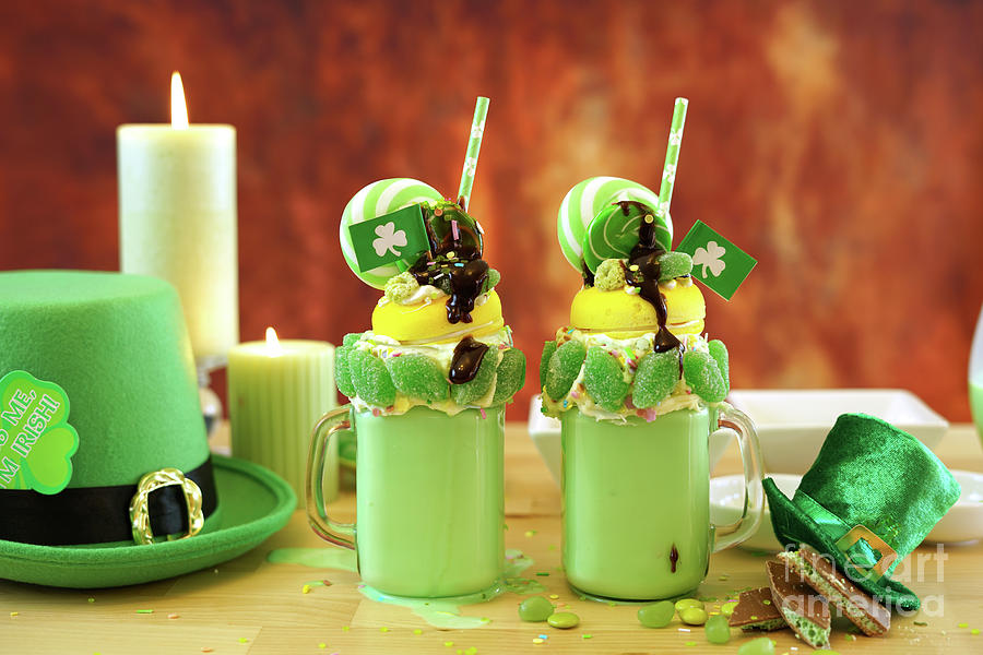 St Patricks Day on-trend holiday freak shakes with candy and lollipops. #2 Photograph by Milleflore Images