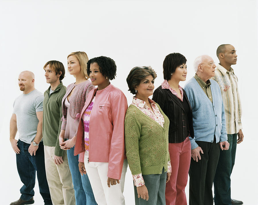 Studio Shot of a Mixed Age, Multiethnic Group of Men and Women Standing in a V Shape #2 Photograph by Digital Vision.