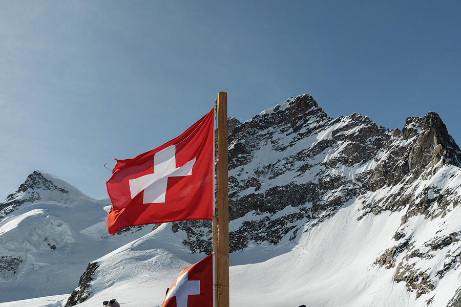 Swiss flag on top of the Jungfraujoch in Switzerland Photograph by ...