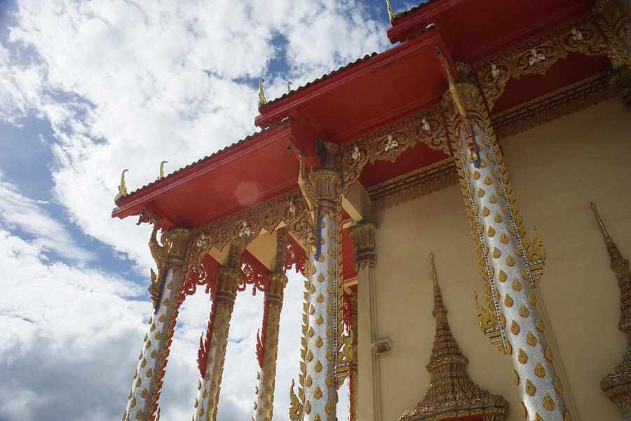 Thai Temple With Blue Sky And Clouds In Background #2 Photograph by IttoIlmatar