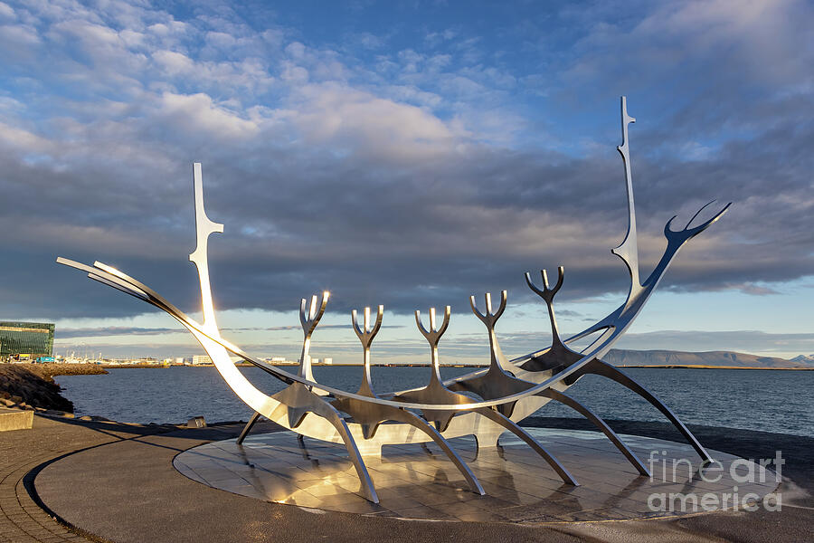 The Sun Voyager, a modern sculpture by Jon Gunnar Arnason, of a viking ship. Sunrise in Reykjavik, Iceland. #2 Photograph by Jane Rix The Sun Voyager, a modern sculpture by Jon Gunnar Arnason, of a viking ship. Sunrise in Reykjavik, Iceland. #2 Photograph by Jane Rix