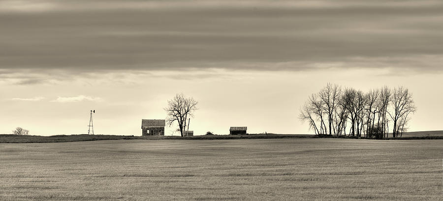 The Vast Forgotten -  Farmhouse on the vast ND prairie Photograph by Peter Herman