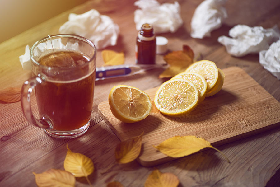 Thermometer, medicine, tissue and a cup of tea on wooden background #2 Photograph by Emilija Manevska