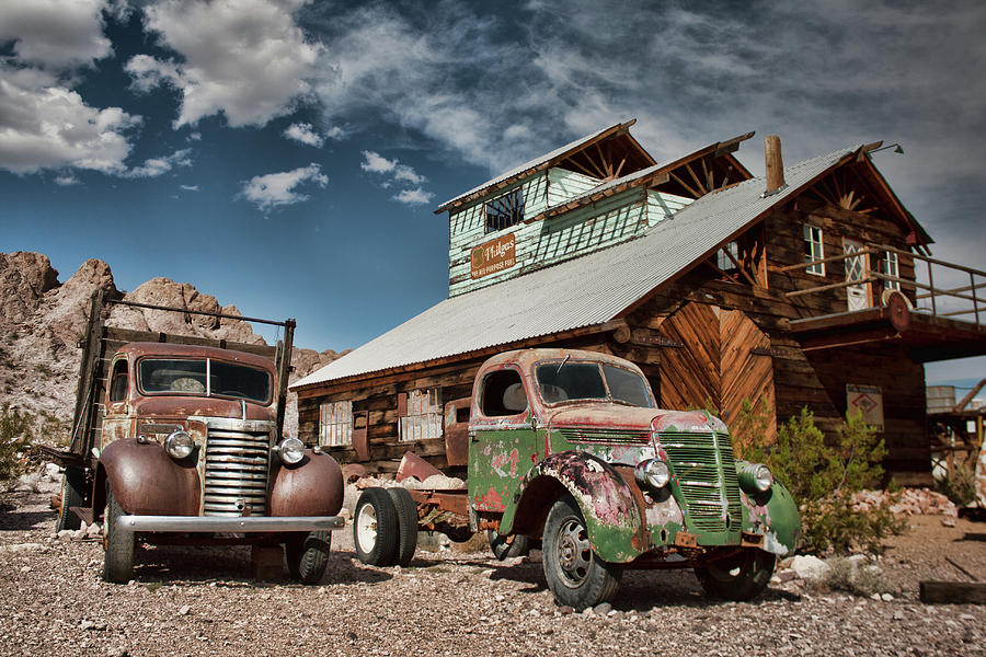 2 Trucks At The Desert Lodge Photograph by Daniel Adams