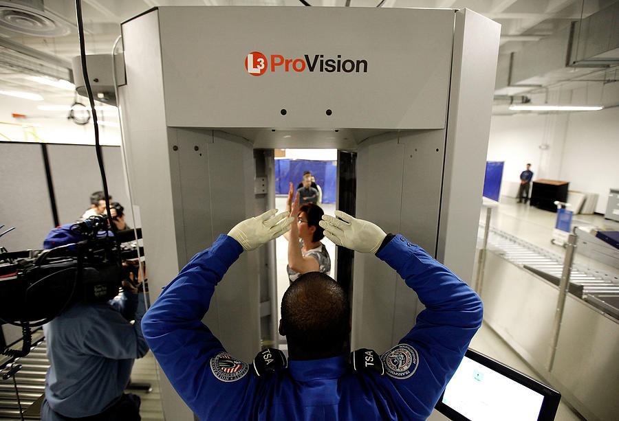 TSA Demonstrates New Imaging Technology At Reagan National Airport Photograph by Chip Somodevilla TSA Demonstrates New Imaging Technology At Reagan National Airport Photograph by Chip Somodevilla