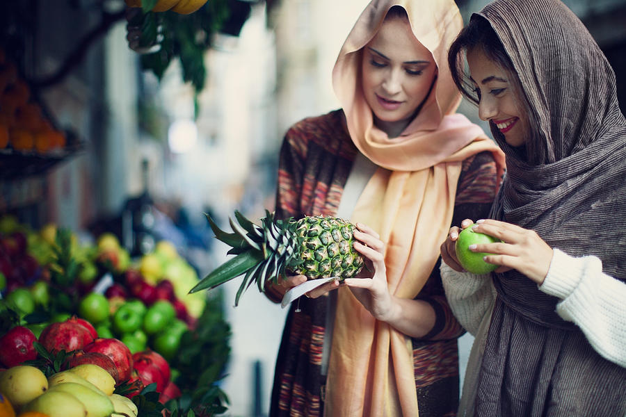 Two Turkish Women Enjoying Shopping #2 Photograph by Piskunov