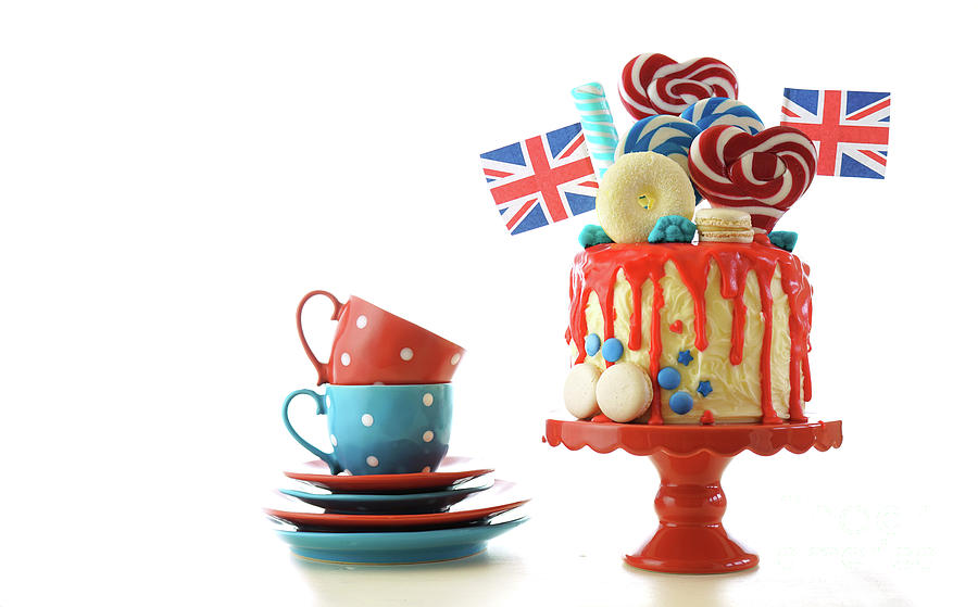 UK candyland drip cake with red white and blue decorations, lollipops and flags. #2 Photograph by Milleflore Images