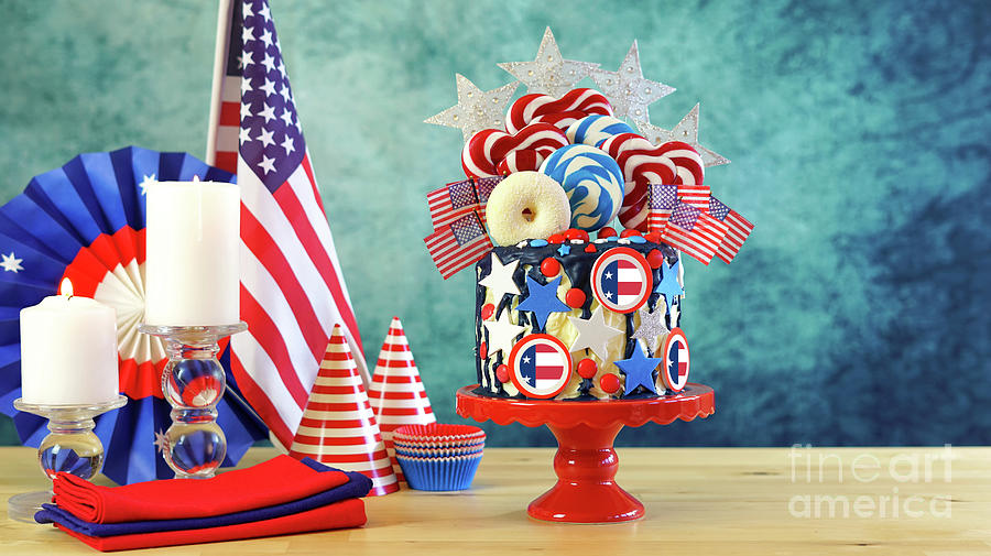 USA theme candyland fantasy drip cake in party table setting. #2 Photograph by Milleflore Images