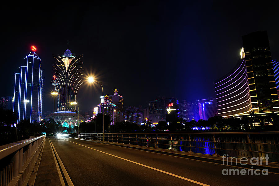 View Of Casino Buildings At Night In Macau City China Photograph