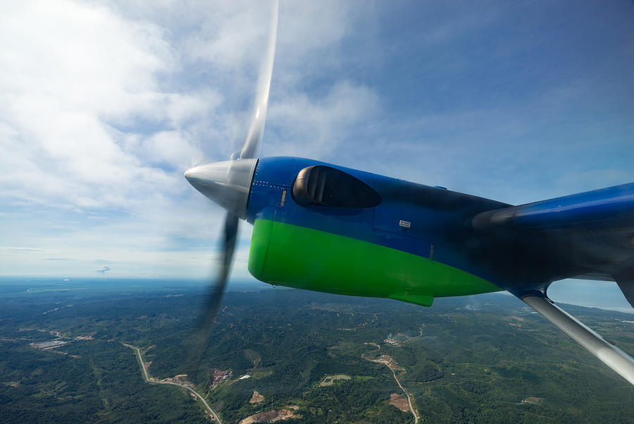 View of MASwings Twin Otter aircraft in flight from Miri to Bario which take about 1 hour flight time. #2 Photograph by Shaifulzamri