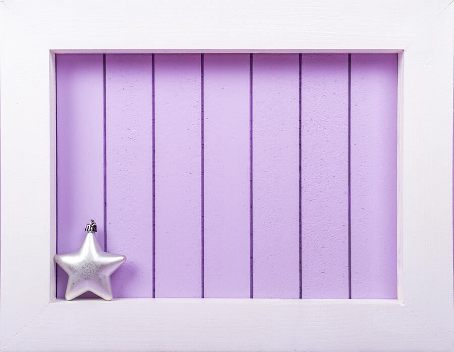 White wooden frame and  christmas decoration over a purple background #2 Photograph by DiyanaDimitrova